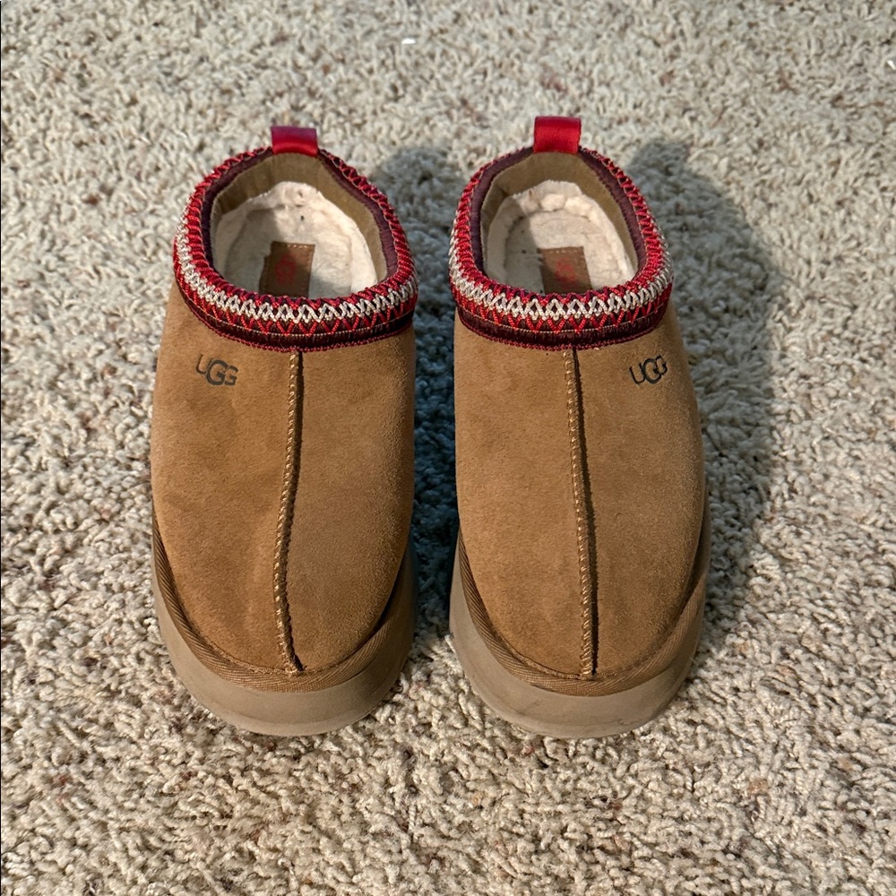 UGG women’s Brown Slip-On Loafers with Red Trim